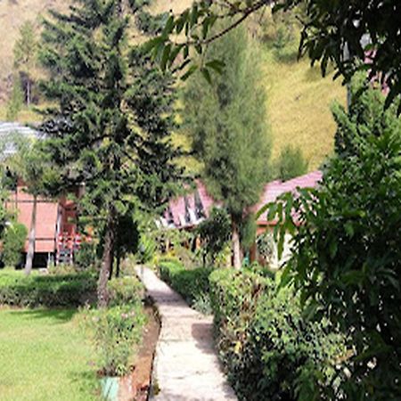 Roman Sinasi Hotel Tongging Bagian luar foto