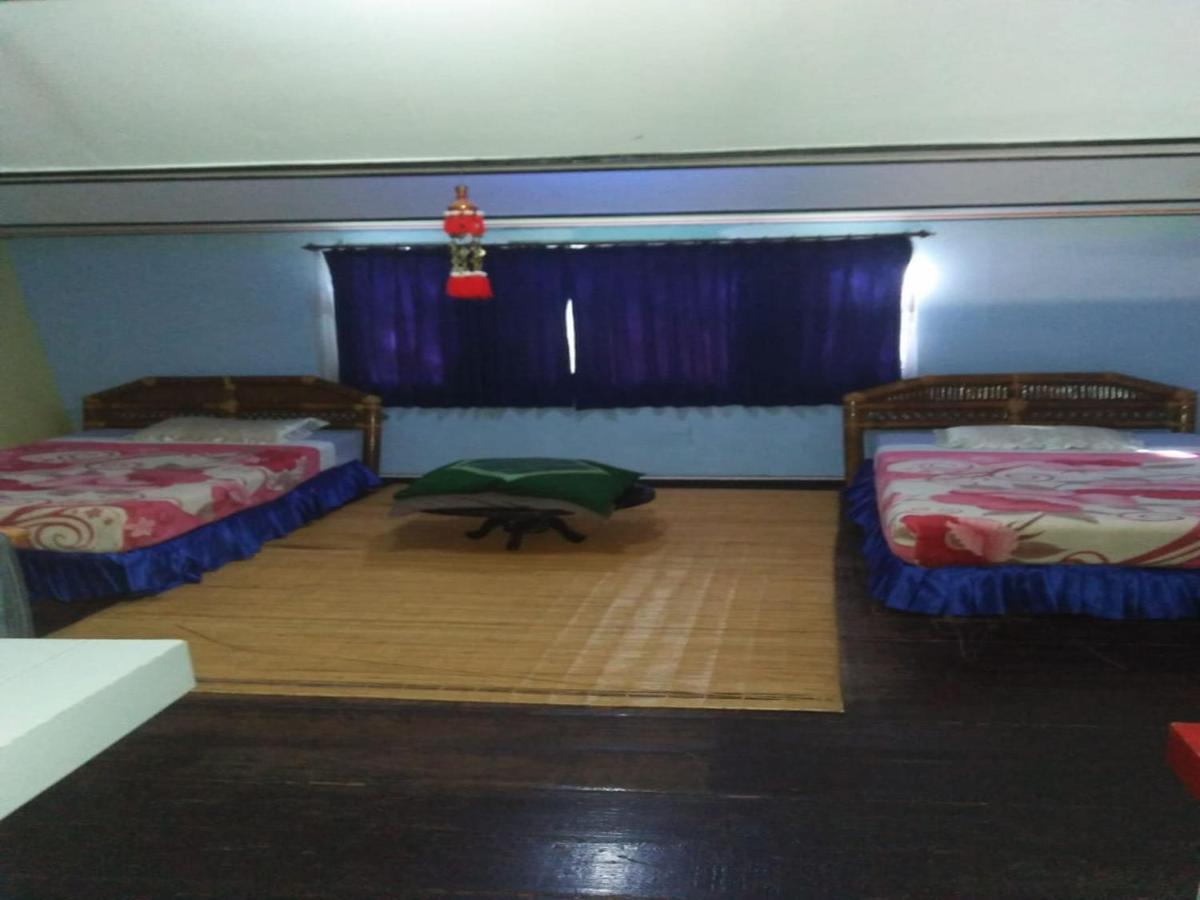 Roman Sinasi Hotel Tongging Bagian luar foto