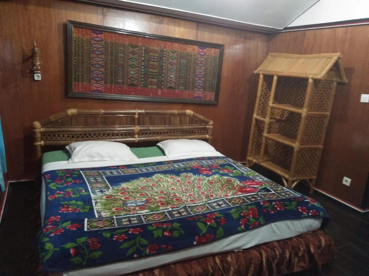 Roman Sinasi Hotel Tongging Bagian luar foto