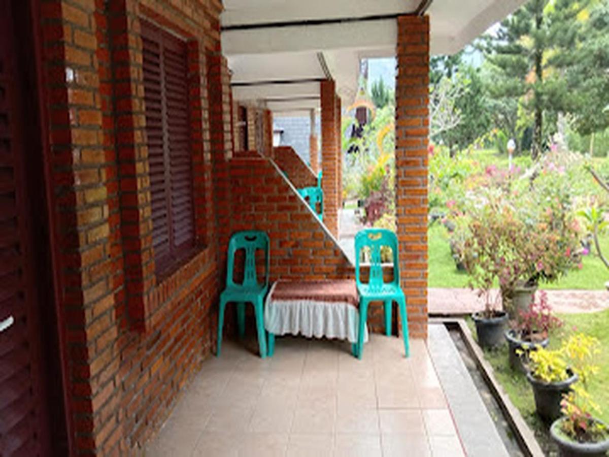 Roman Sinasi Hotel Tongging Bagian luar foto