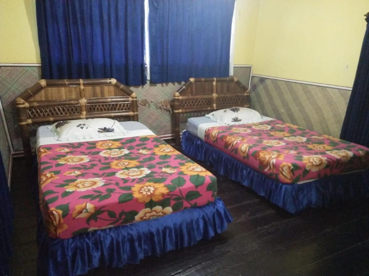 Roman Sinasi Hotel Tongging Bagian luar foto