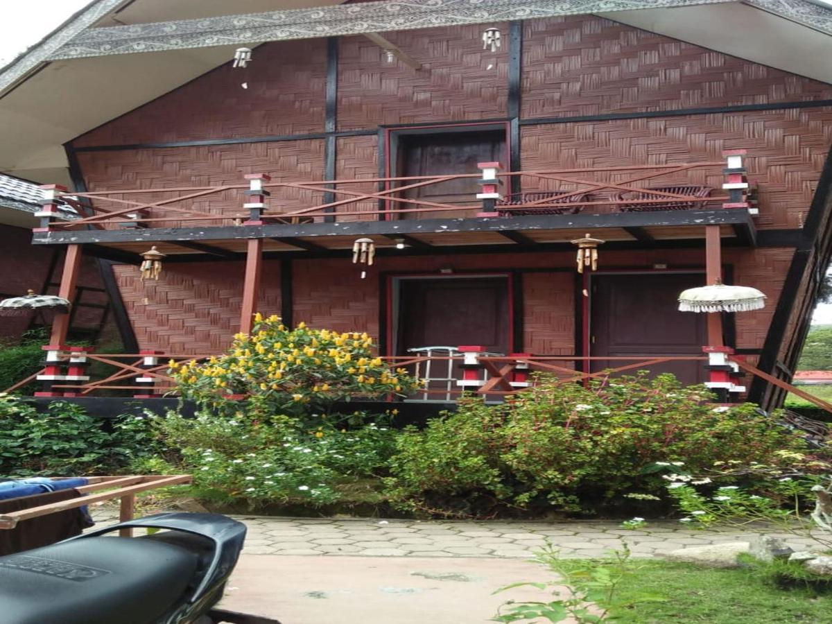 Roman Sinasi Hotel Tongging Bagian luar foto