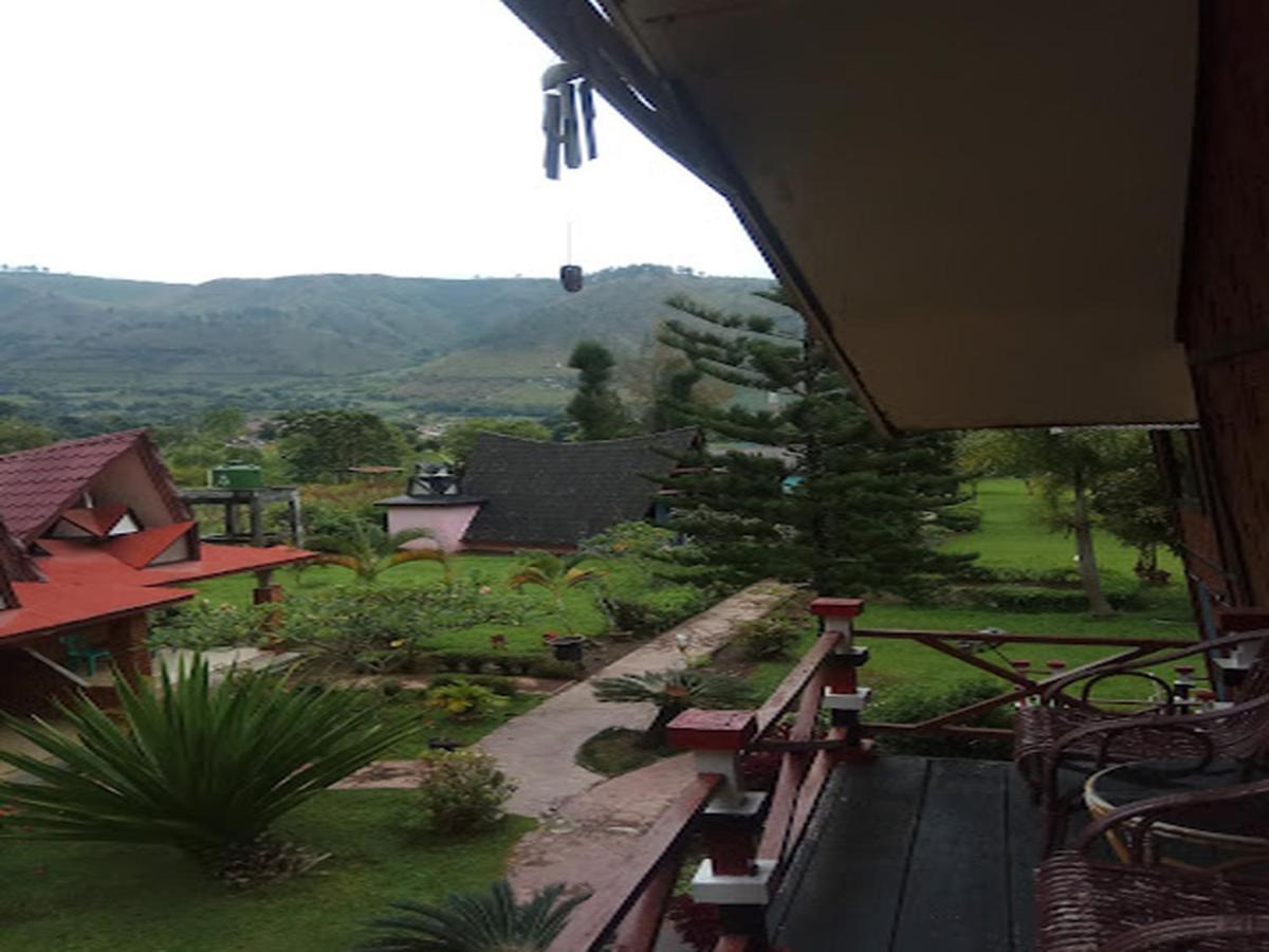 Roman Sinasi Hotel Tongging Bagian luar foto